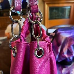 Inc pink hobo bag with silver ring’s hardware